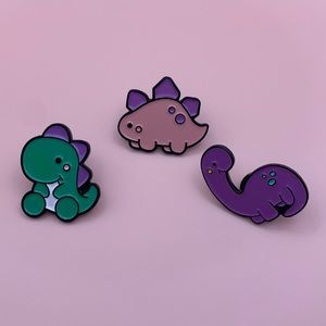 Dinosaur pins